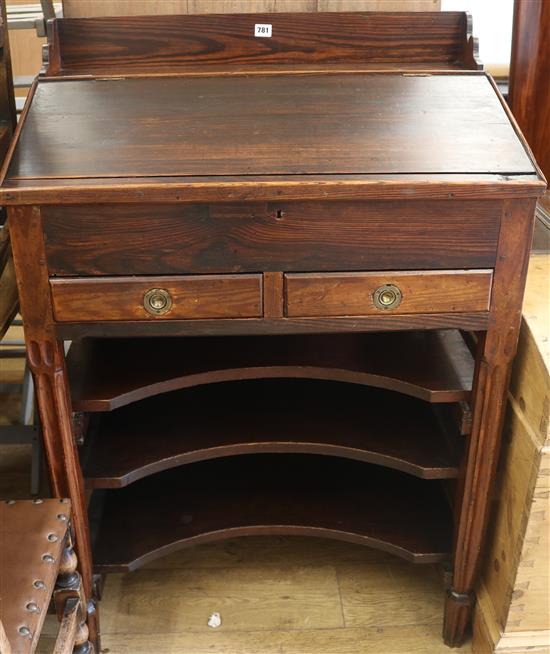 A stained pine students desk, H.121cm